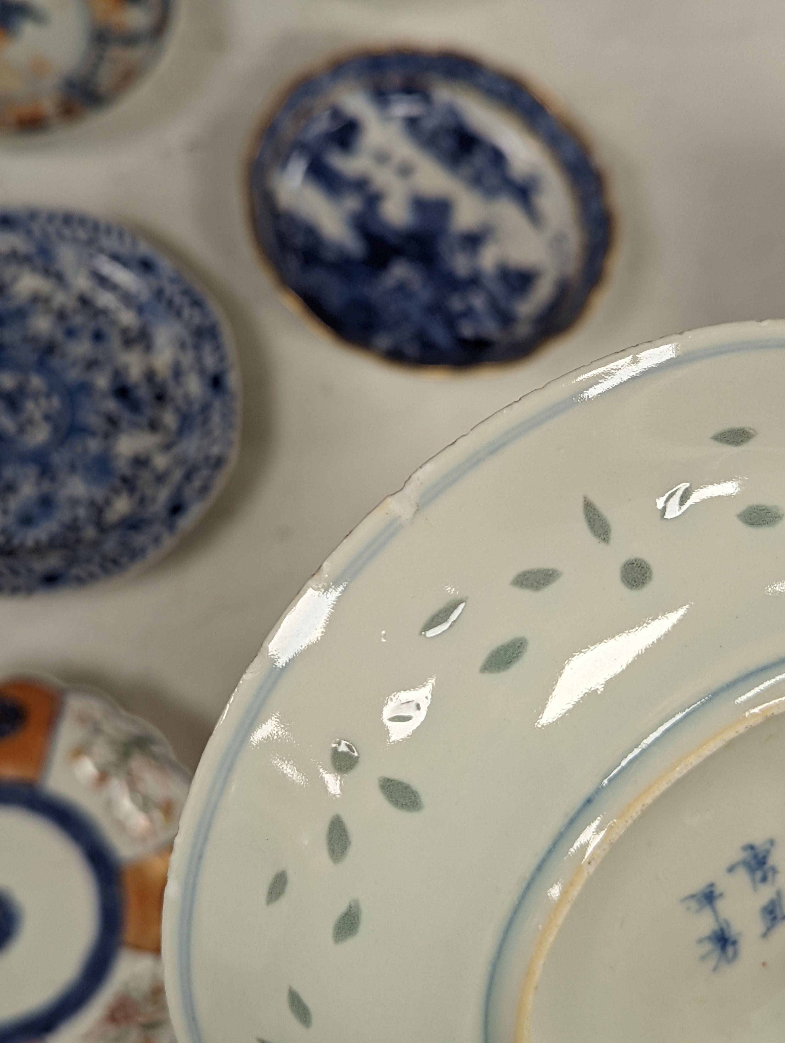 Ten various Chinese porcelain saucer dishes, largest 15cm